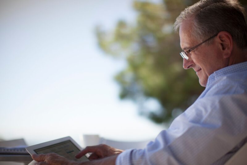 Man looking at Career in Real Estate on ipad